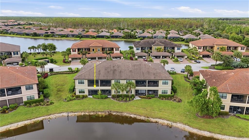 9426 Benvenuto Court, Unit 2104 Naples, FL 34119 - Photo 39 of 45 an aerial view of multiple houses