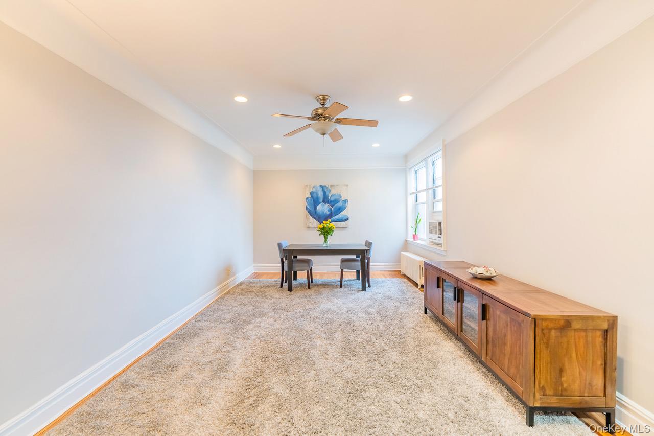 4 Maple Drive, Unit 6O Great Neck, NY 11021 - Photo 13 of 28 a living room with furniture