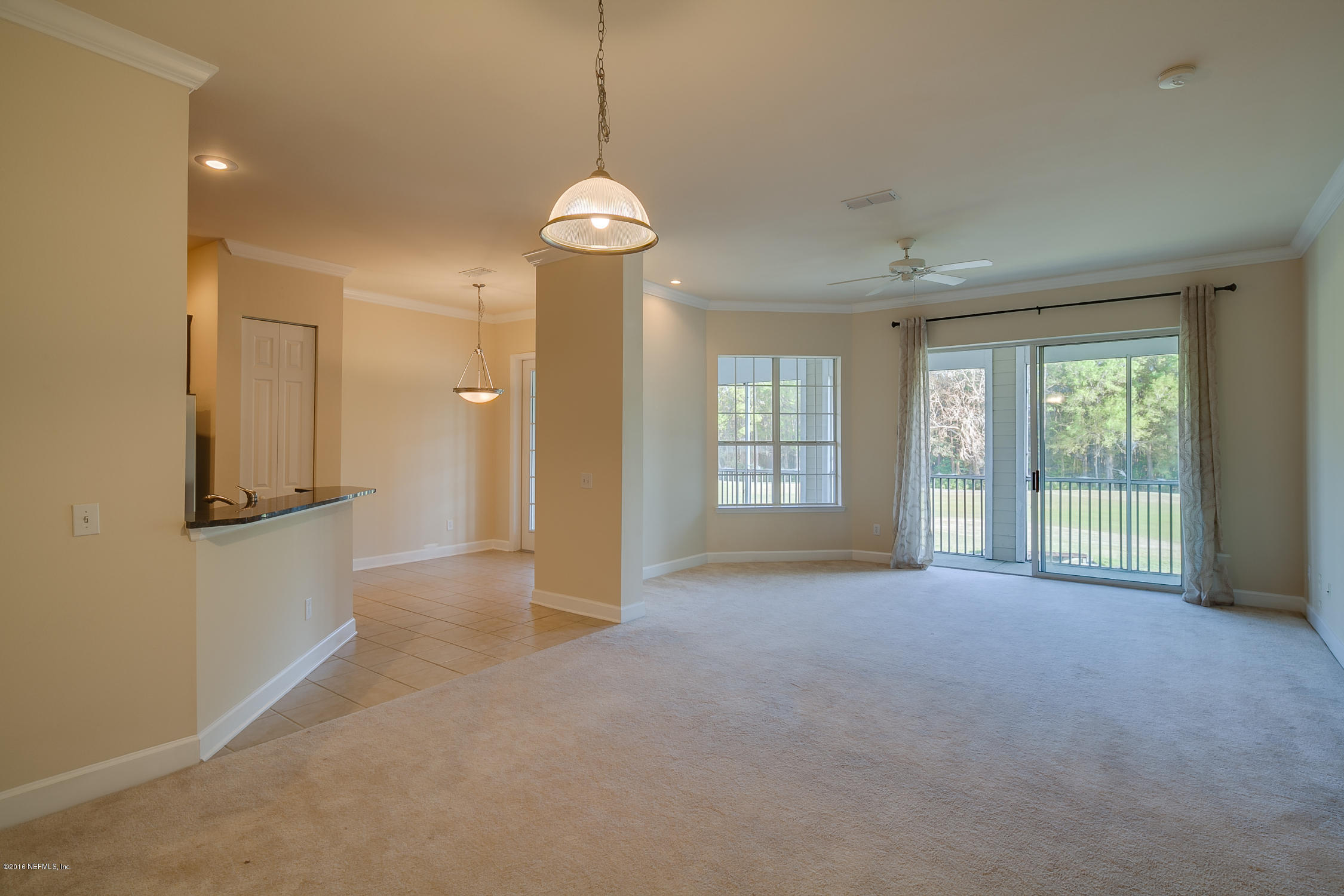 2014 Pond Ridge Court, Unit 1105 Fleming Island, FL 32003 - Photo 16 of 32 Dining_Room_-_Living_Room