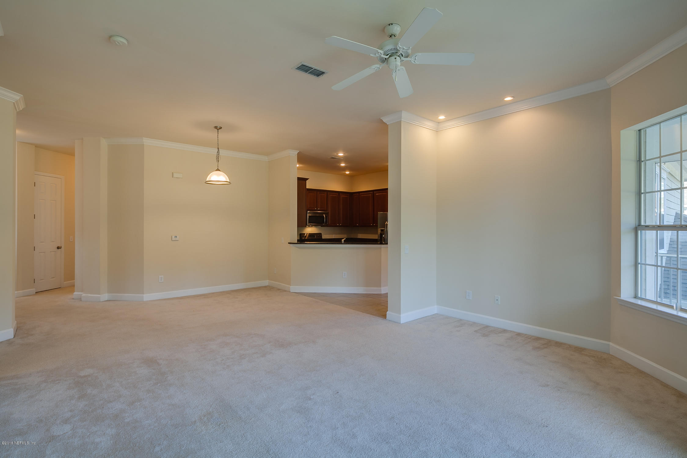 2014 Pond Ridge Court, Unit 1105 Fleming Island, FL 32003 - Photo 17 of 32 Living_Room_-_Dining_Room