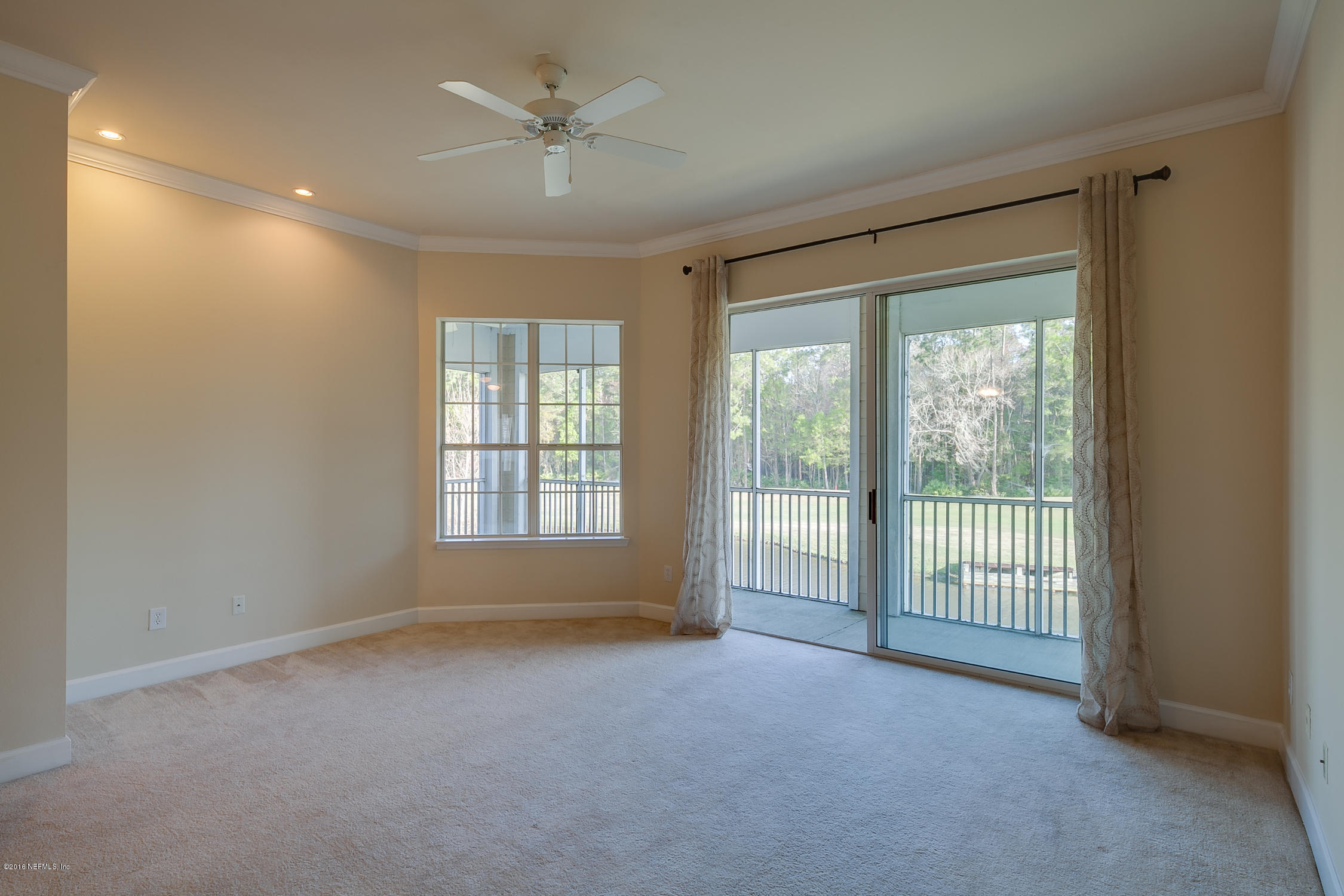 2014 Pond Ridge Court, Unit 1105 Fleming Island, FL 32003 - Photo 18 of 32 Living_Room