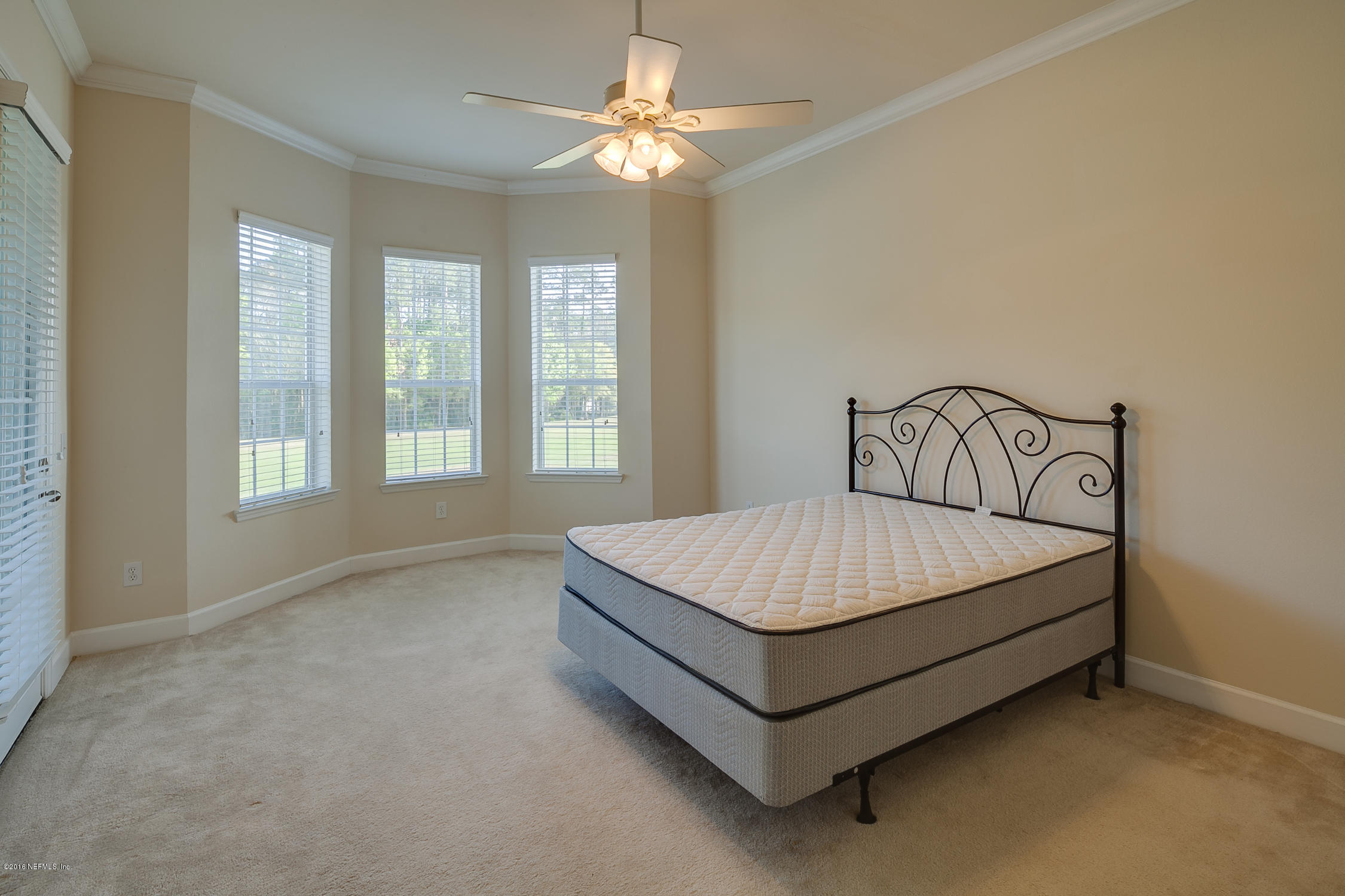 2014 Pond Ridge Court, Unit 1105 Fleming Island, FL 32003 - Photo 19 of 32 Master_Bedroom_View_1