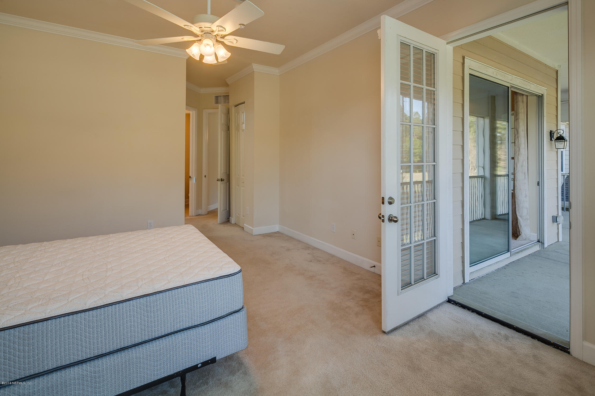 2014 Pond Ridge Court, Unit 1105 Fleming Island, FL 32003 - Photo 20 of 32 Master_Bedroom_View_2