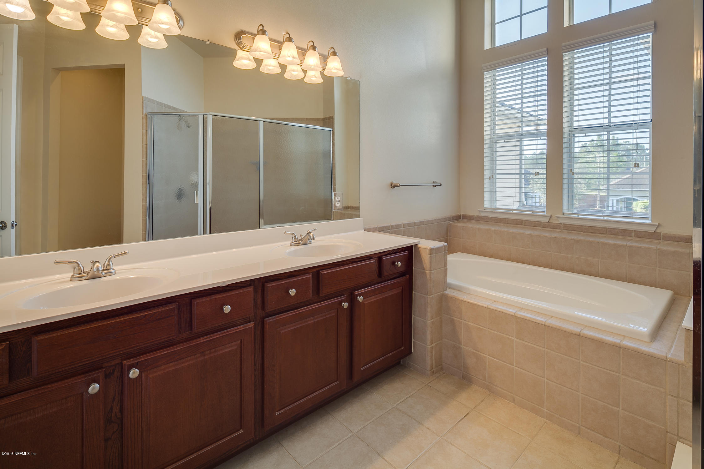2014 Pond Ridge Court, Unit 1105 Fleming Island, FL 32003 - Photo 21 of 32 Master_Bathroom_View_1