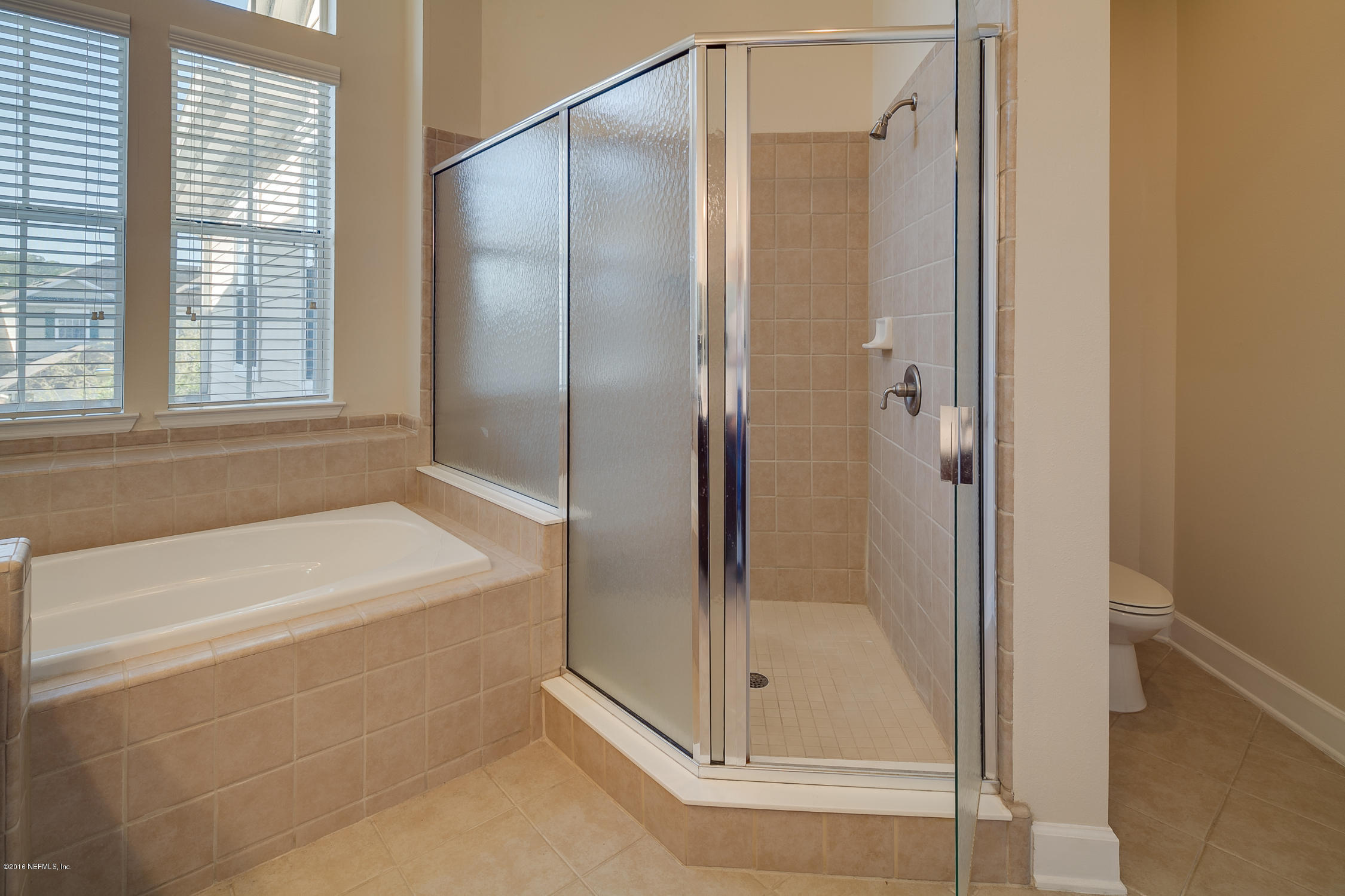 2014 Pond Ridge Court, Unit 1105 Fleming Island, FL 32003 - Photo 22 of 32 Master_Bathroom_View_2