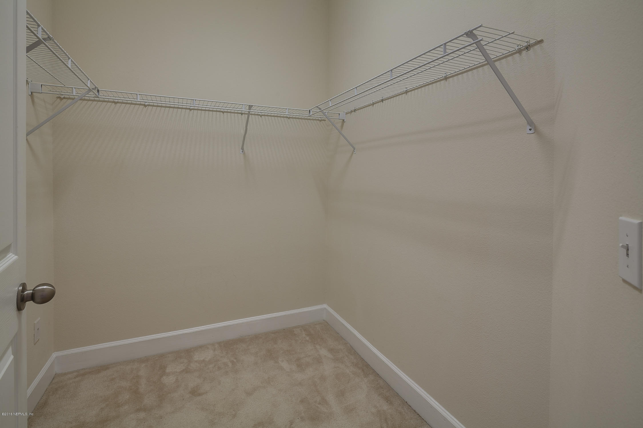 2014 Pond Ridge Court, Unit 1105 Fleming Island, FL 32003 - Photo 23 of 32 Master_Walk-In_Closet