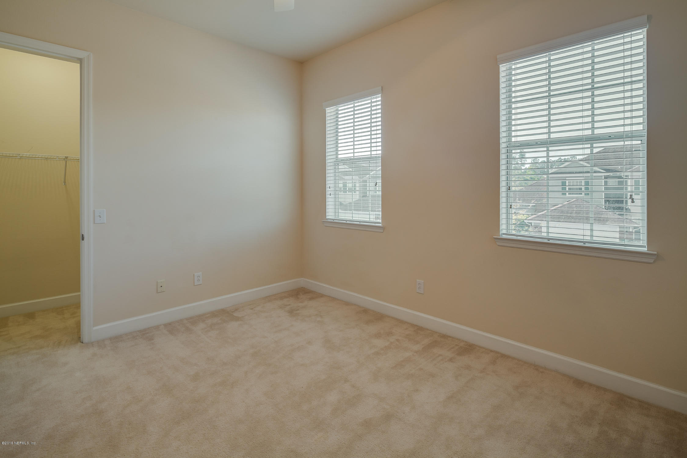 2014 Pond Ridge Court, Unit 1105 Fleming Island, FL 32003 - Photo 24 of 32 Bedroom_2_View_1