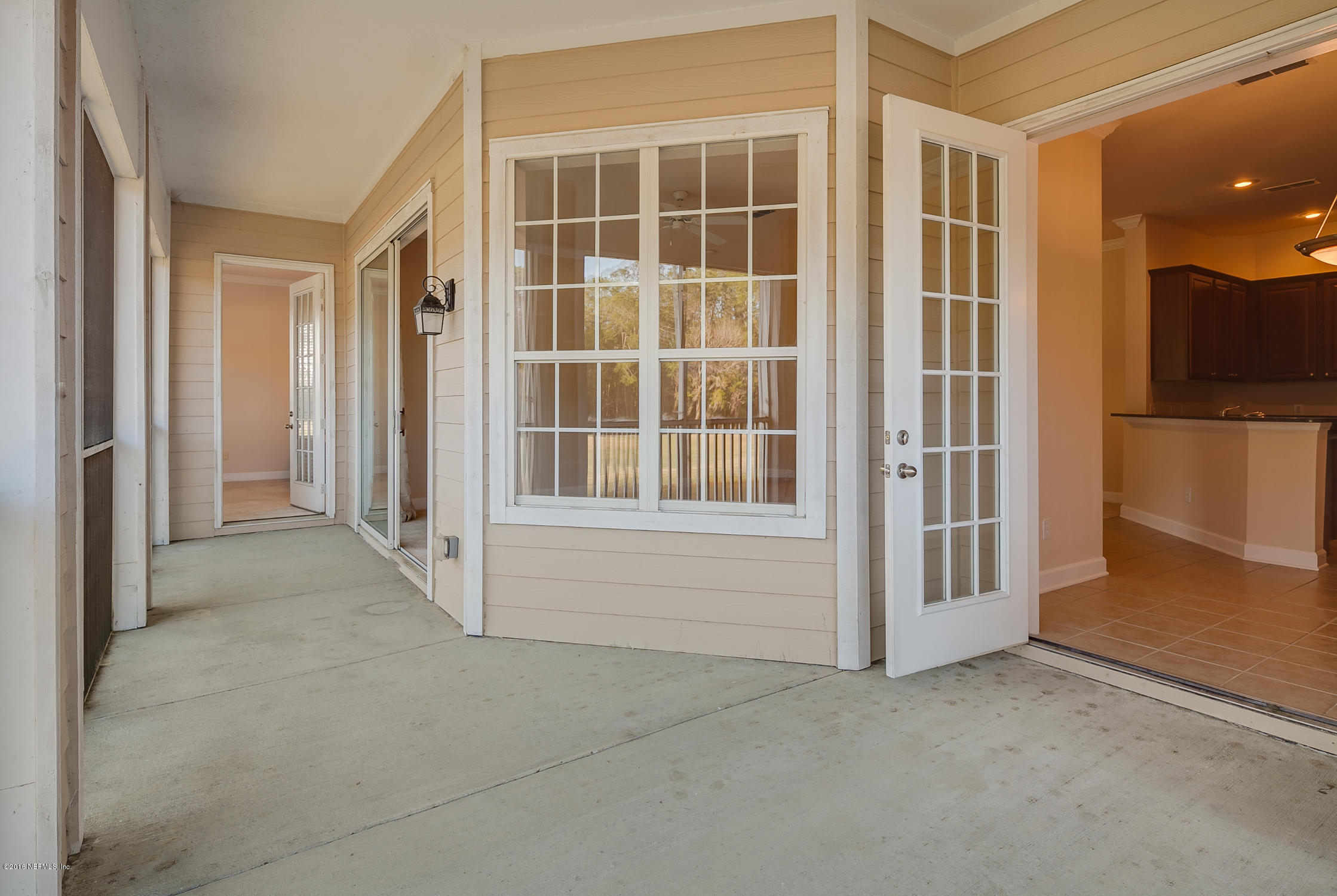2014 Pond Ridge Court, Unit 1105 Fleming Island, FL 32003 - Photo 31 of 32 Screened_Lanai_View_1