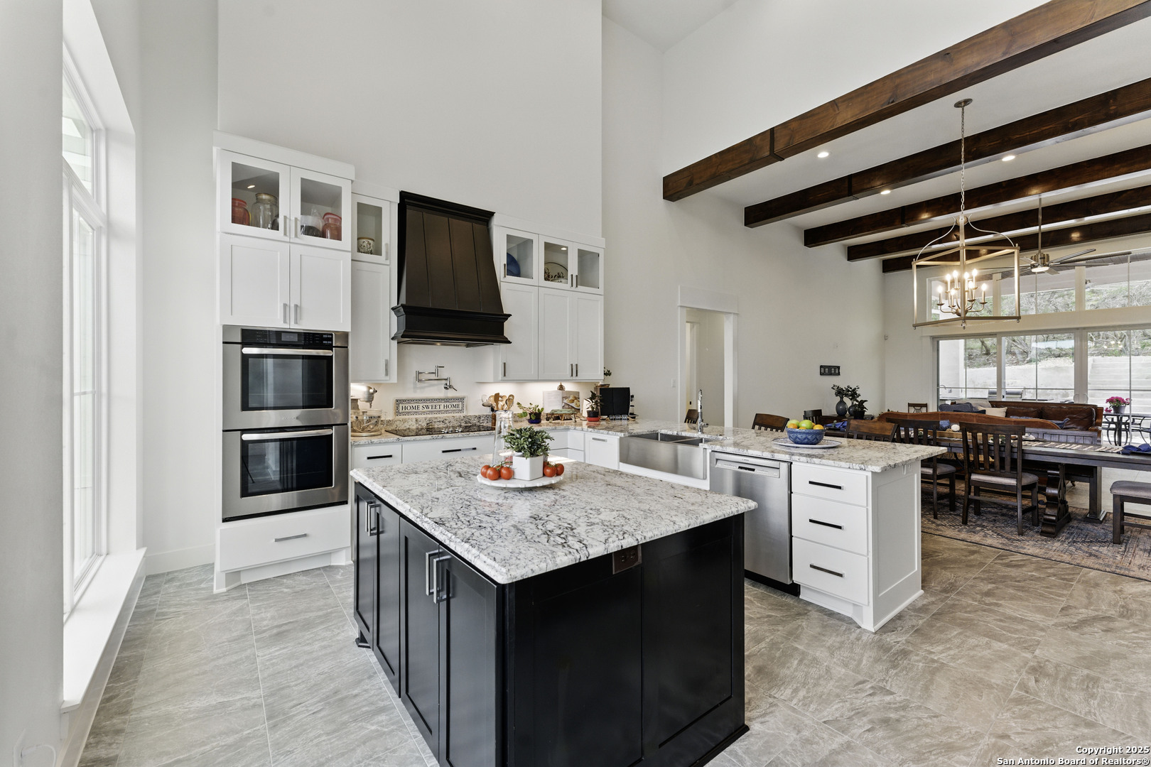 321 Bentwood Drive Spring Branch, TX 78070 - Photo 14 of 50 a kitchen with a stove a sink and a refrigerator