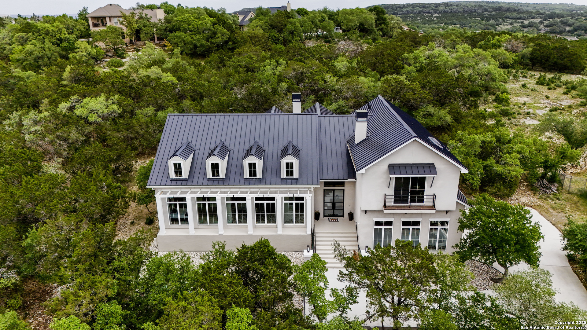 321 Bentwood Drive Spring Branch, TX 78070 - Photo 2 of 50 an aerial view of a house with a yard