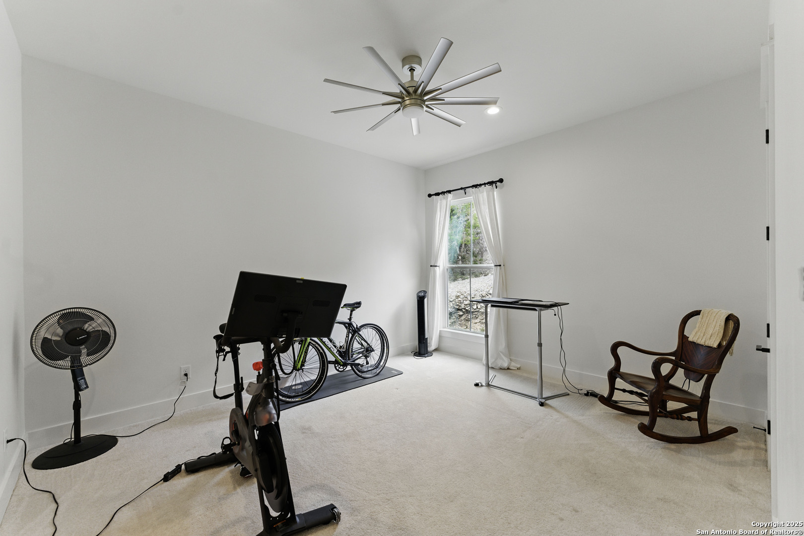 321 Bentwood Drive Spring Branch, TX 78070 - Photo 29 of 50 a view of a workspace with furniture and a window