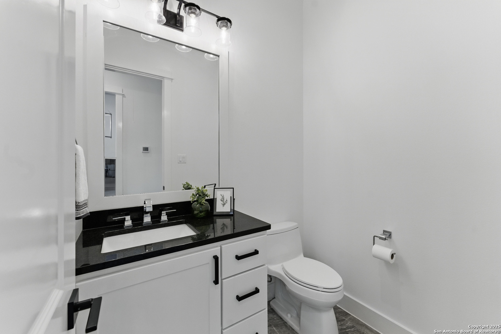 321 Bentwood Drive Spring Branch, TX 78070 - Photo 30 of 50 a bathroom with a granite countertop sink and a toilet