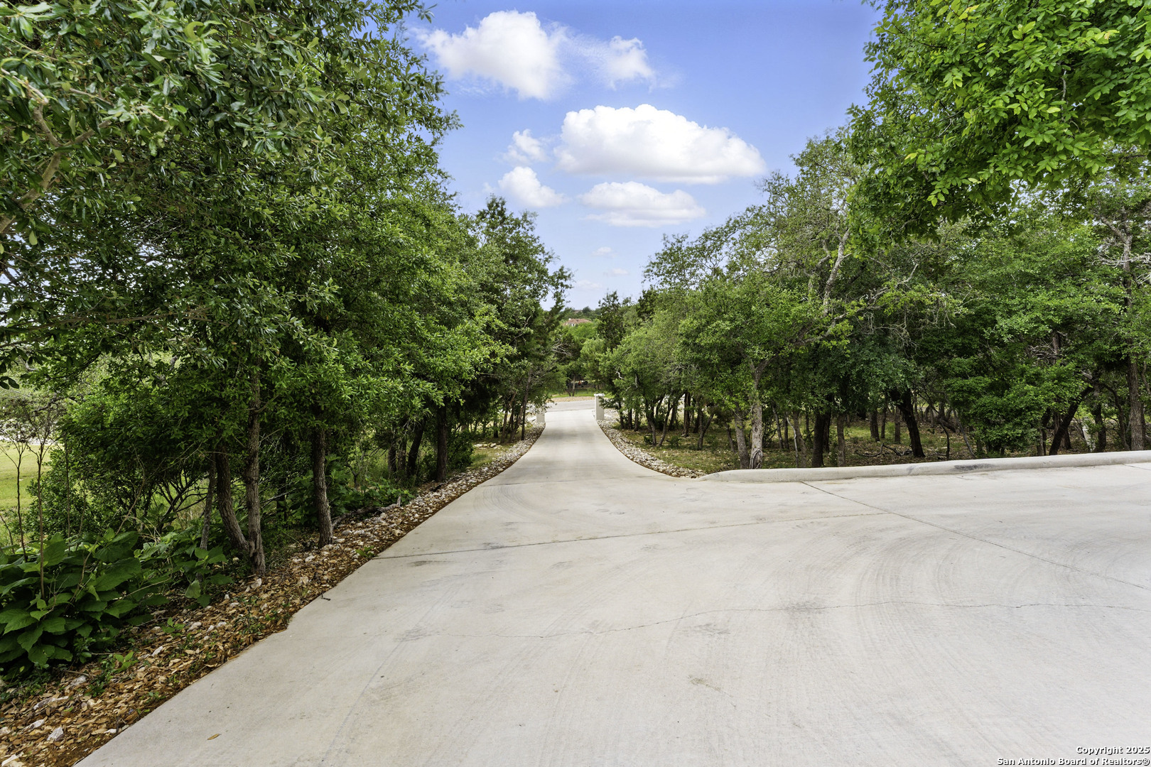 321 Bentwood Drive Spring Branch, TX 78070 - Photo 6 of 50 a wooden bench with view of trees