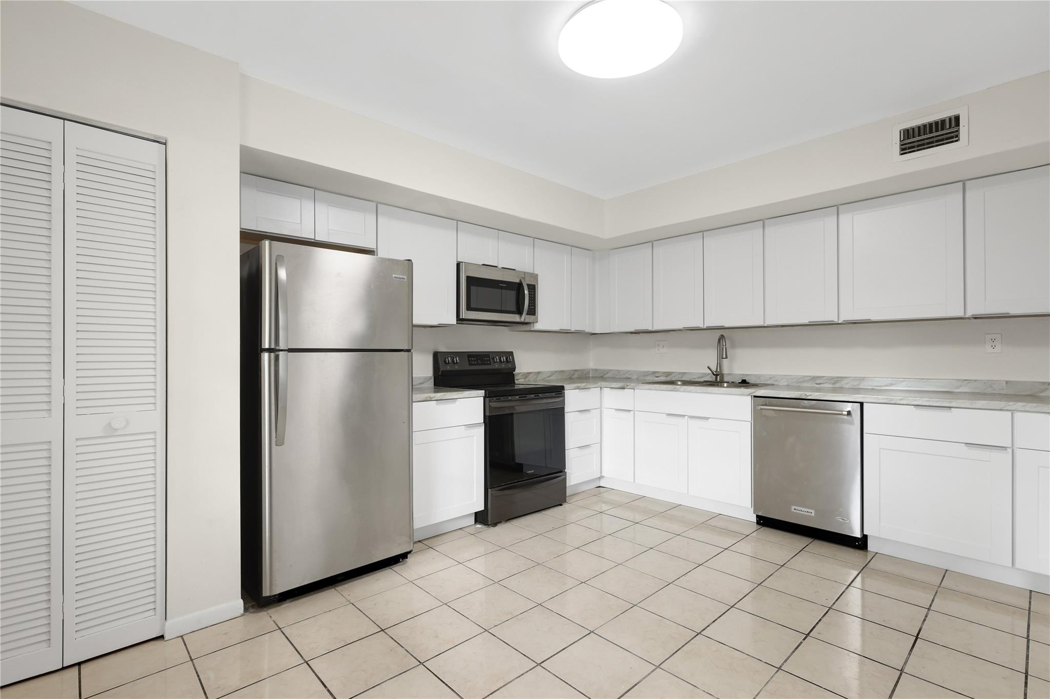 3940 Inverrary Boulevard Lauderhill, FL 33319 - Photo 10 of 36 Newly Updated Kitchen