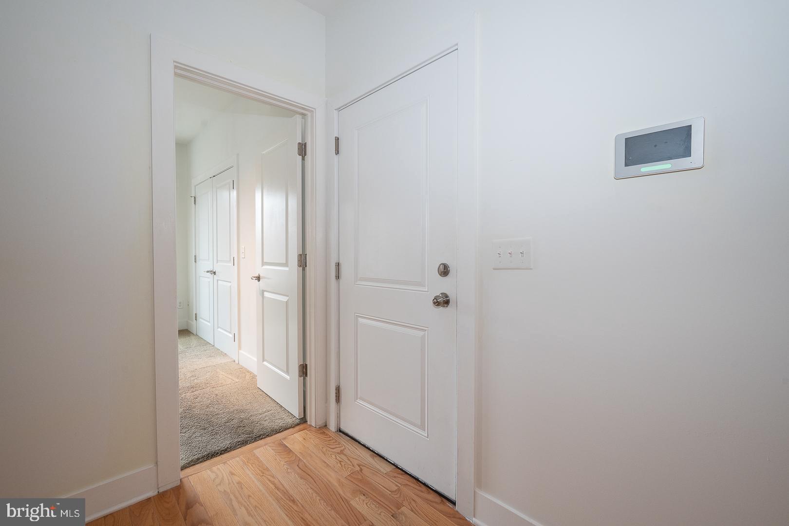 110 Naudain Street, Unit 4 Philadelphia, PA 19147 - Photo 2 of 45 a view of a hallway with wooden floor