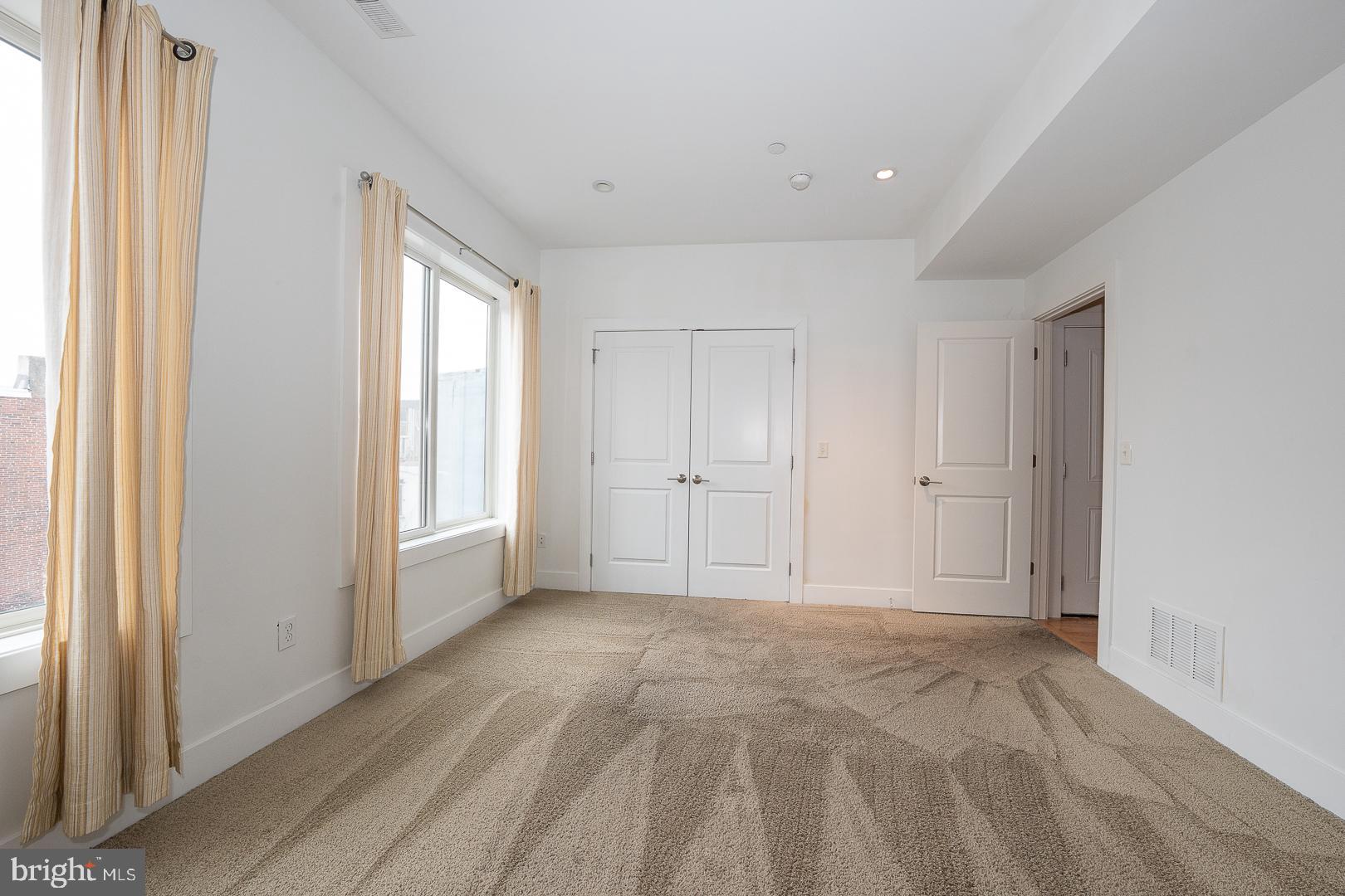 110 Naudain Street, Unit 4 Philadelphia, PA 19147 - Photo 3 of 45 a view of an empty room with a window