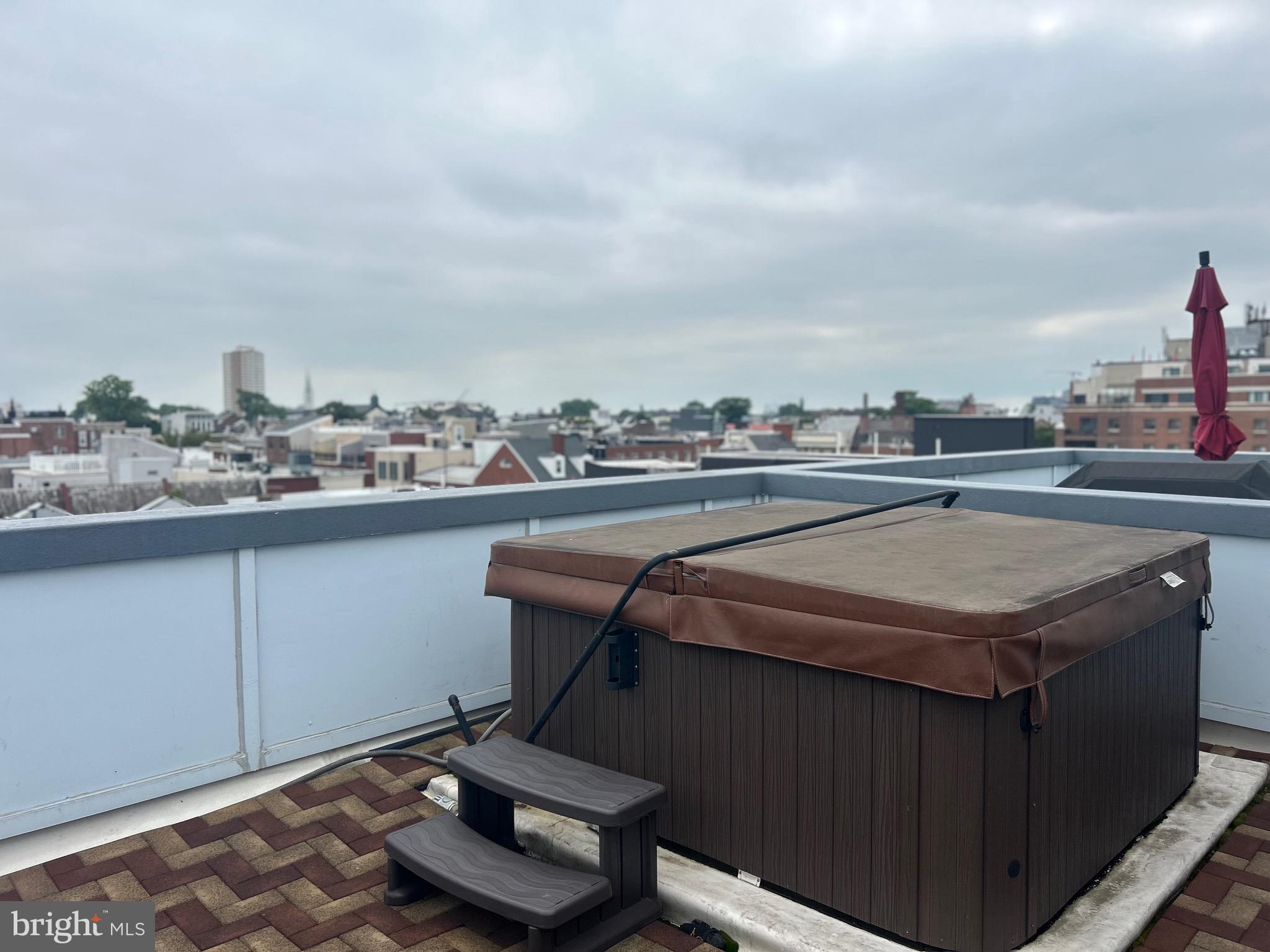 110 Naudain Street, Unit 4 Philadelphia, PA 19147 - Photo 41 of 45 a view of a chairs and table on the terrace