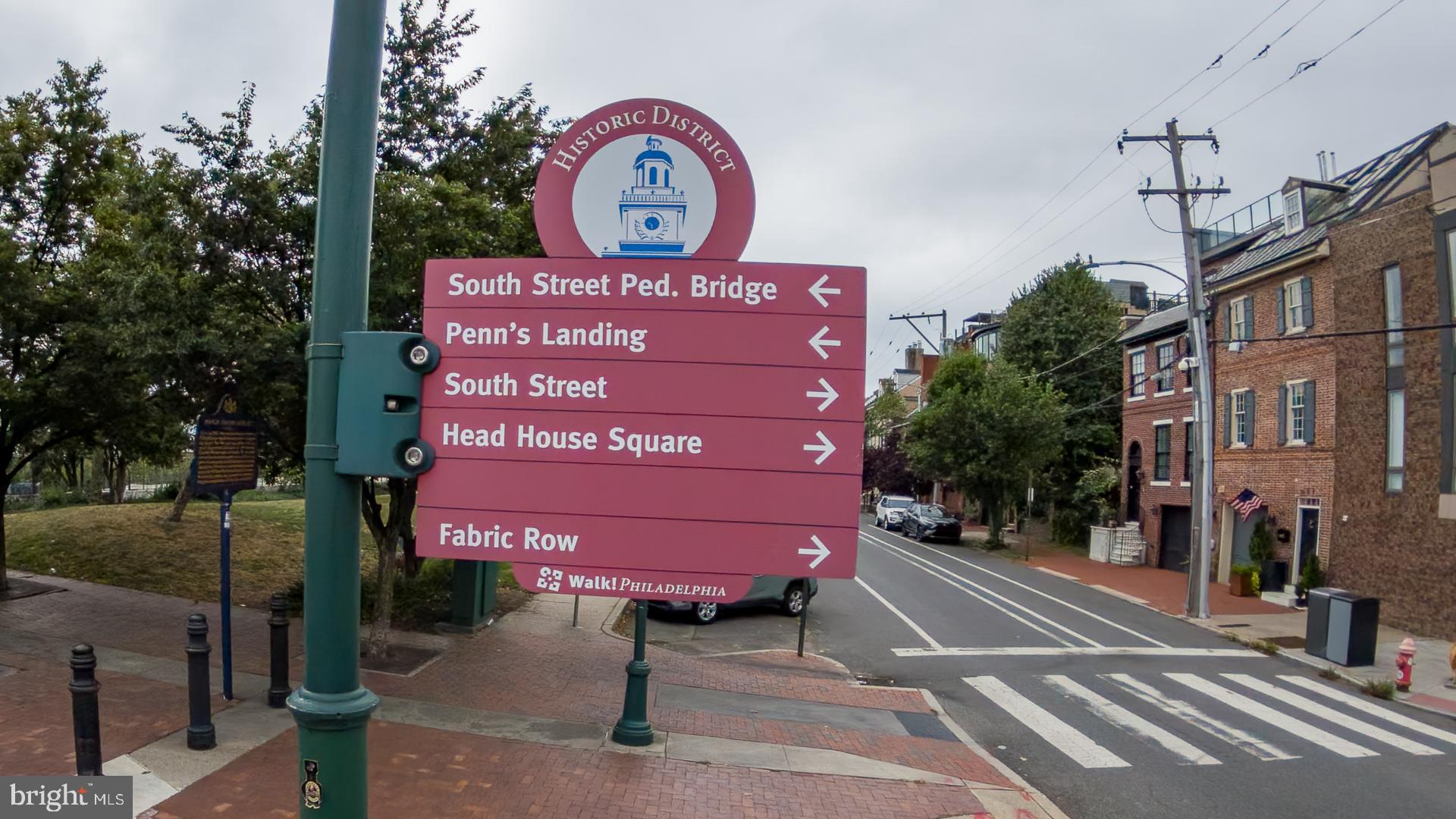 110 Naudain Street, Unit 4 Philadelphia, PA 19147 - Photo 44 of 45 a sign on a street next to a building