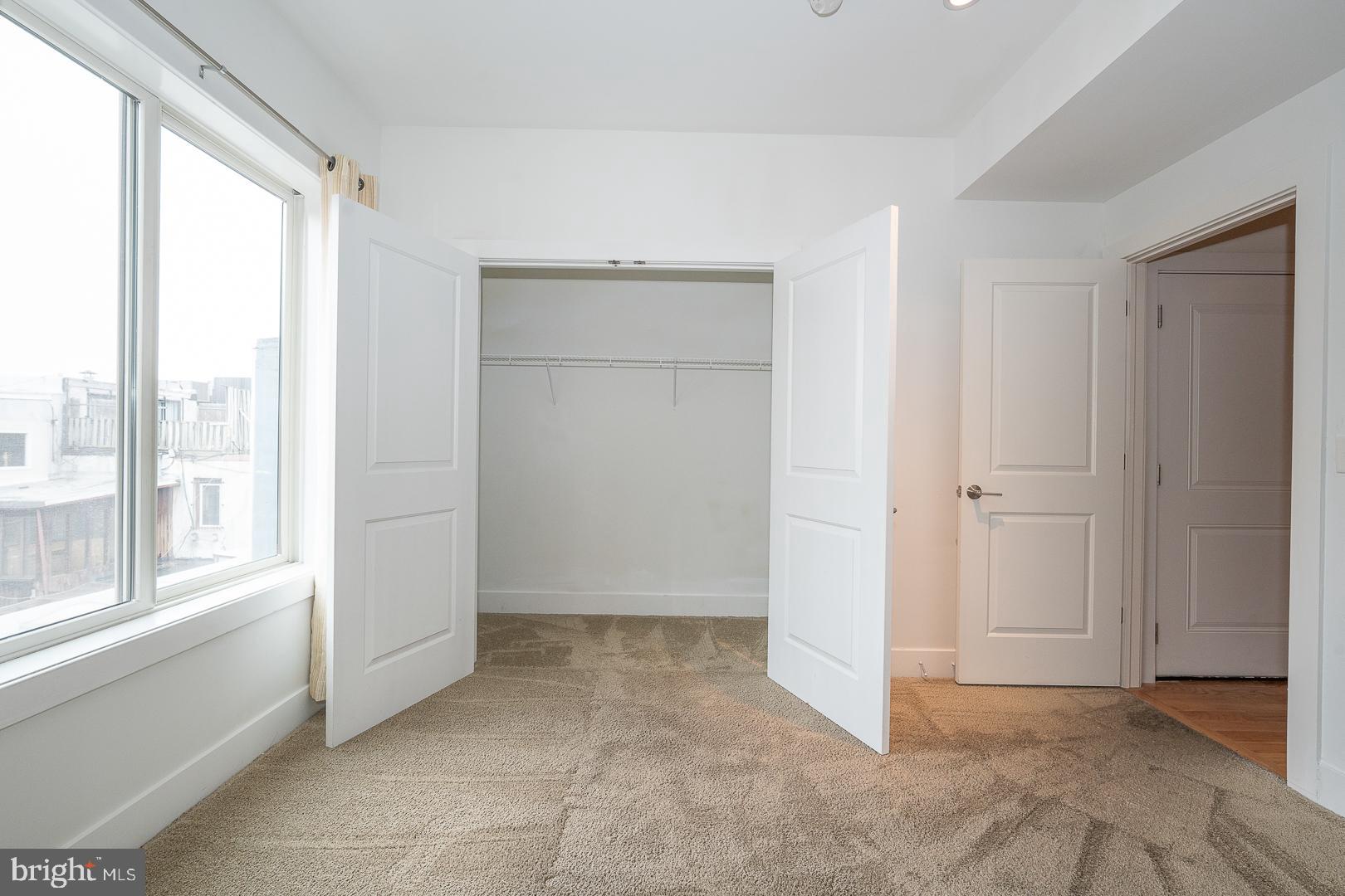 110 Naudain Street, Unit 4 Philadelphia, PA 19147 - Photo 5 of 45 a view of an empty room with a window