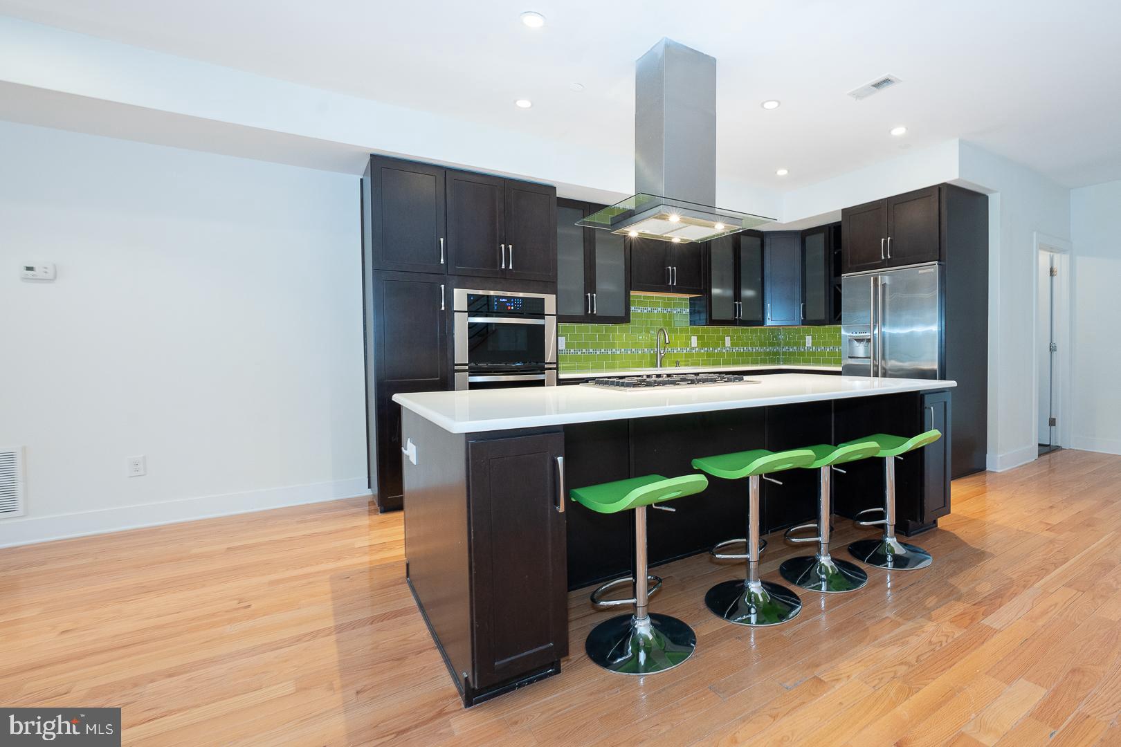 110 Naudain Street, Unit 4 Philadelphia, PA 19147 - Photo 8 of 45 a kitchen with a sink and a microwave