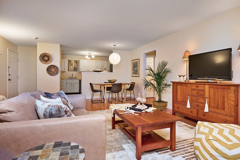 44 Evergreen Road, Unit 302 Northampton, MA 01053 - Photo 4 of 22 a living room with furniture and a flat screen tv