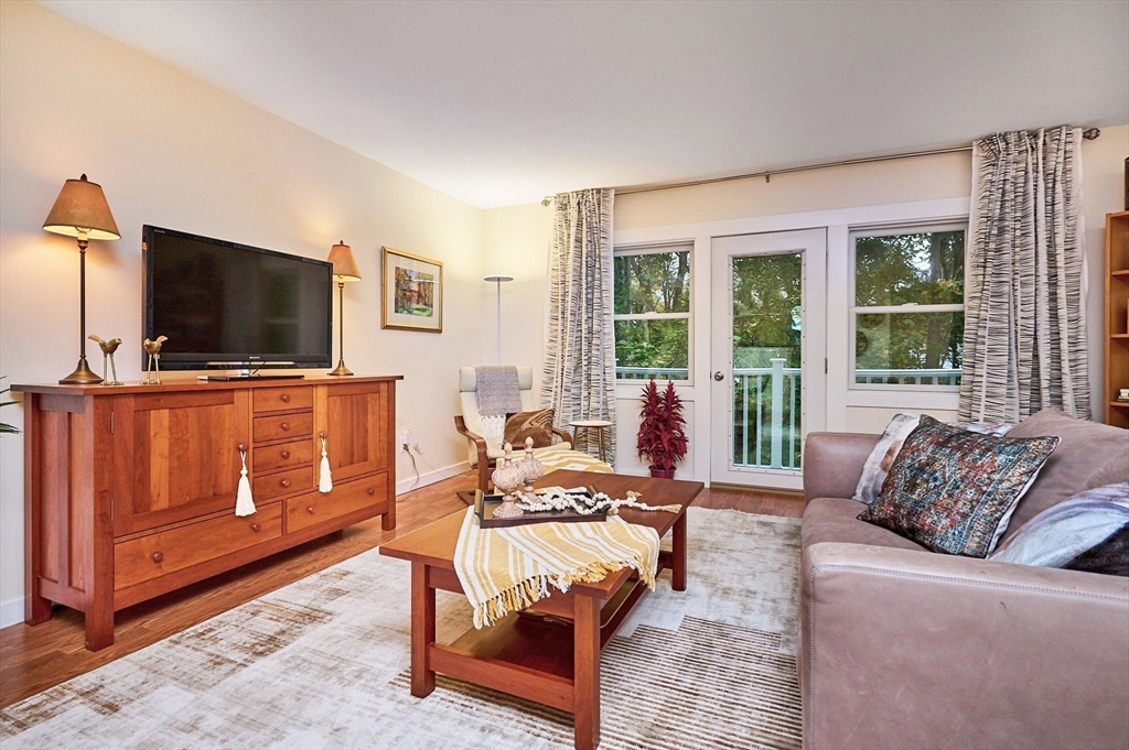 44 Evergreen Road, Unit 302 Northampton, MA 01053 - Photo 9 of 22 a living room with furniture and flat screen tv