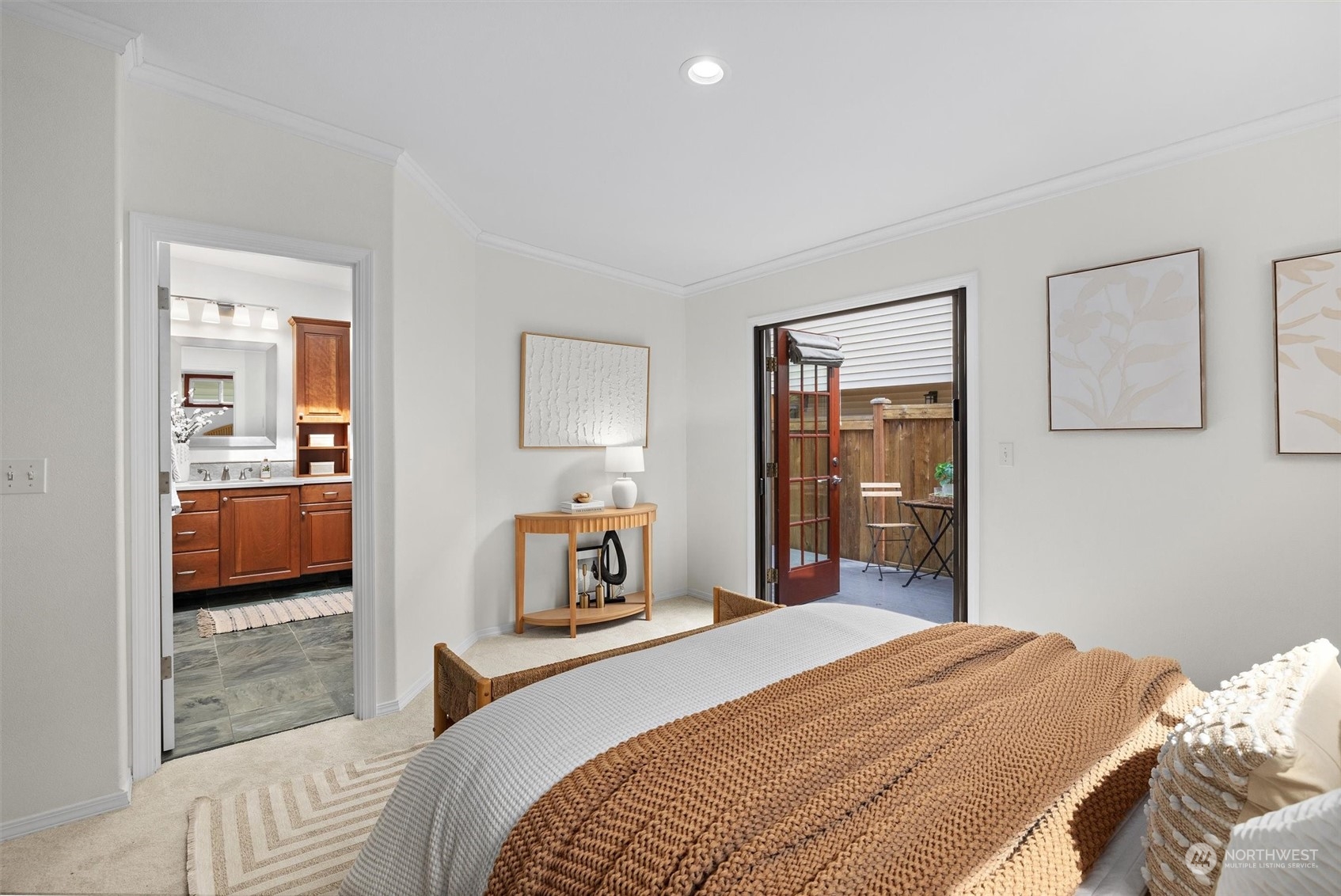 730 Laurel Street Edmonds, WA 98020 - Photo 16 of 36 a bedroom with a bed and a view of kitchen