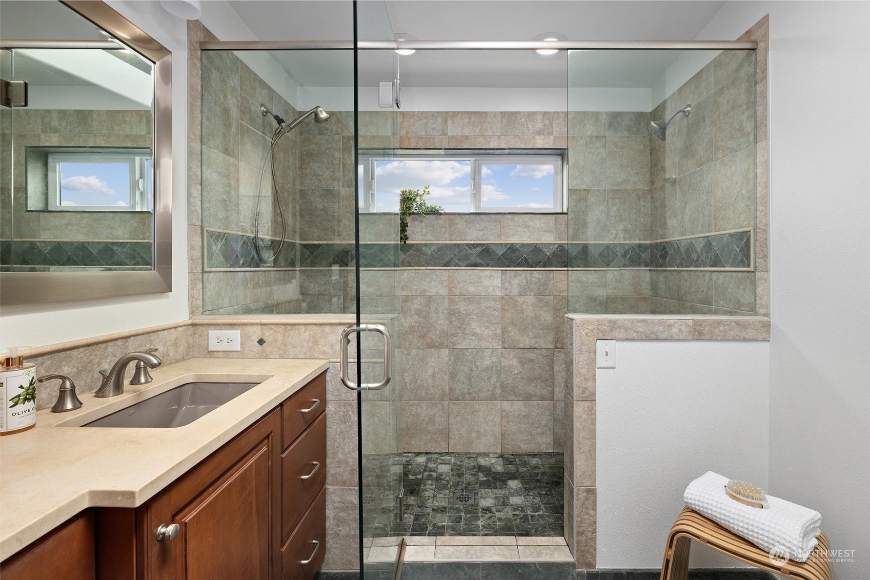 730 Laurel Street Edmonds, WA 98020 - Photo 18 of 36 a bathroom with a sink and a mirror