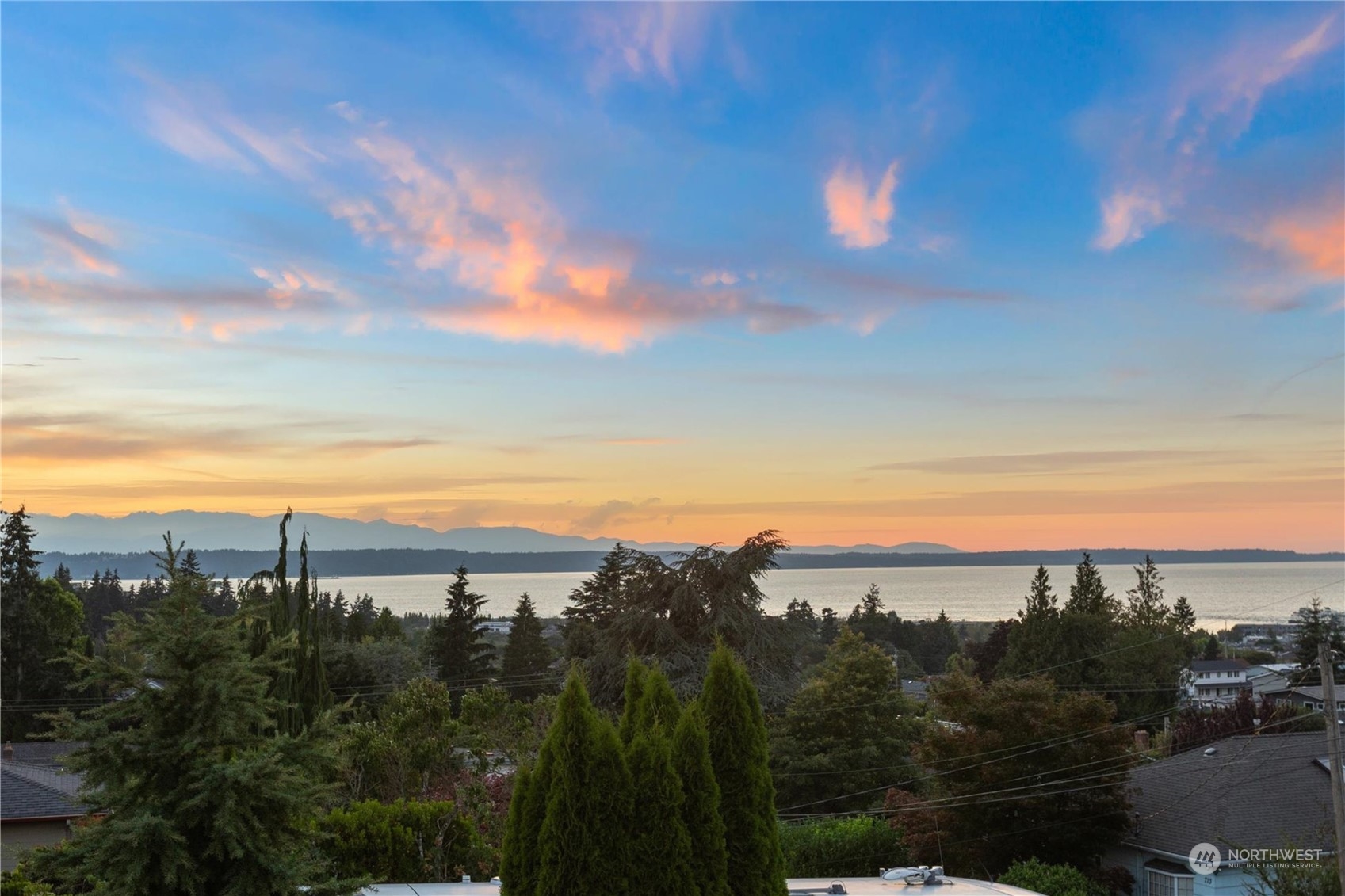 730 Laurel Street Edmonds, WA 98020 - Photo 2 of 36 a view of a city and sunset