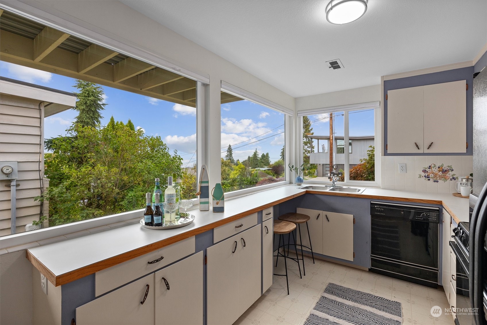730 Laurel Street Edmonds, WA 98020 - Photo 27 of 36 a kitchen with a sink and large window
