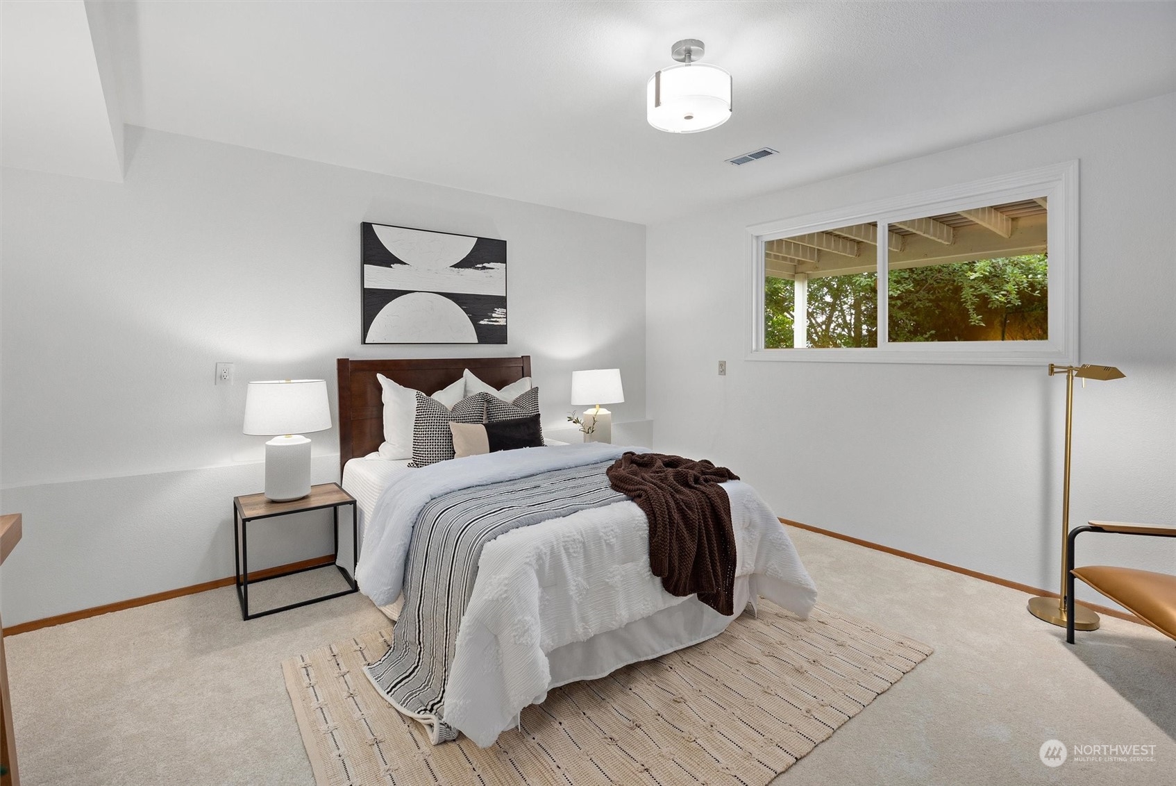 730 Laurel Street Edmonds, WA 98020 - Photo 29 of 36 a bedroom with a bed and a window