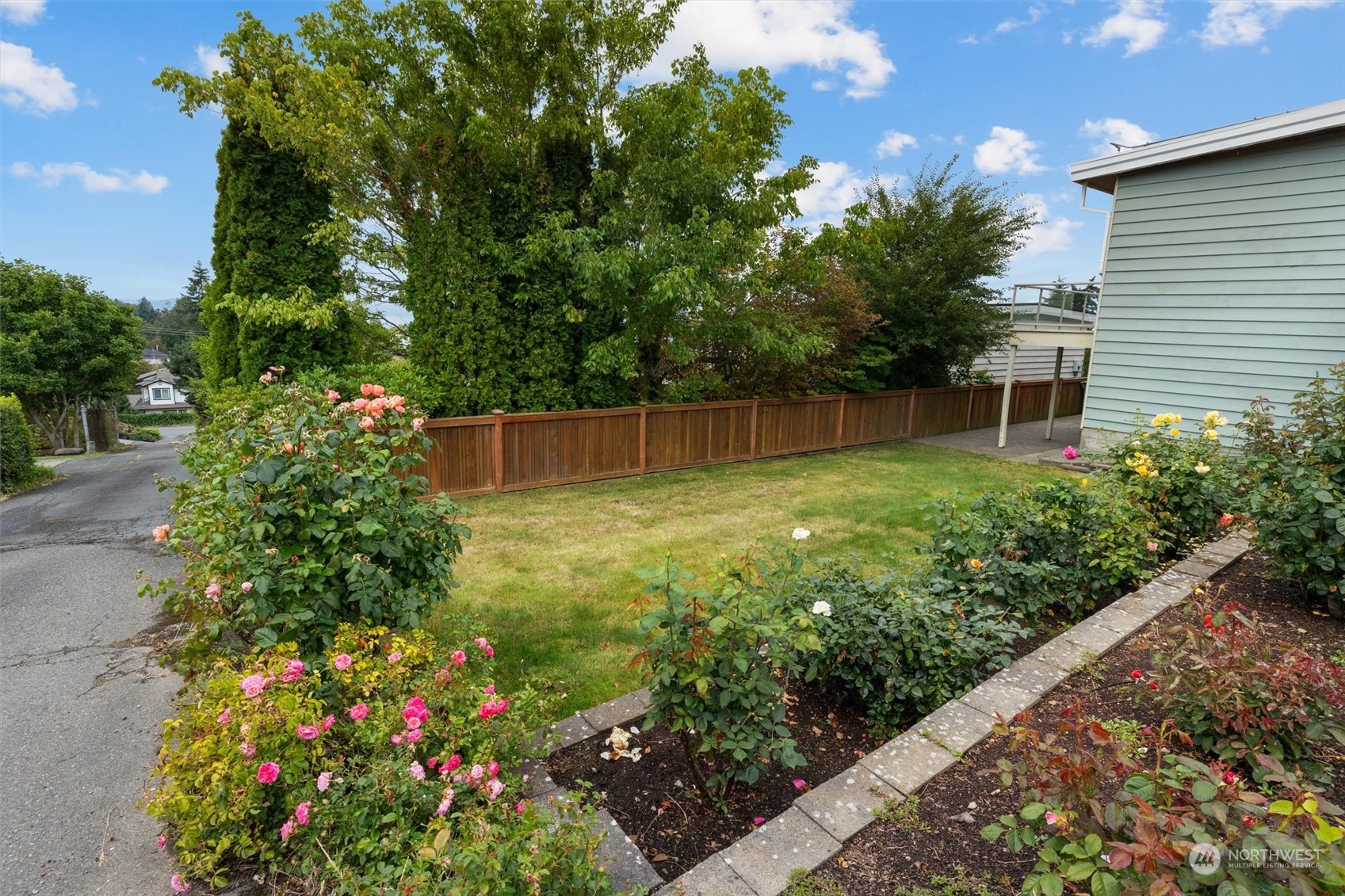 730 Laurel Street Edmonds, WA 98020 - Photo 33 of 36 a view of a garden with a flower garden