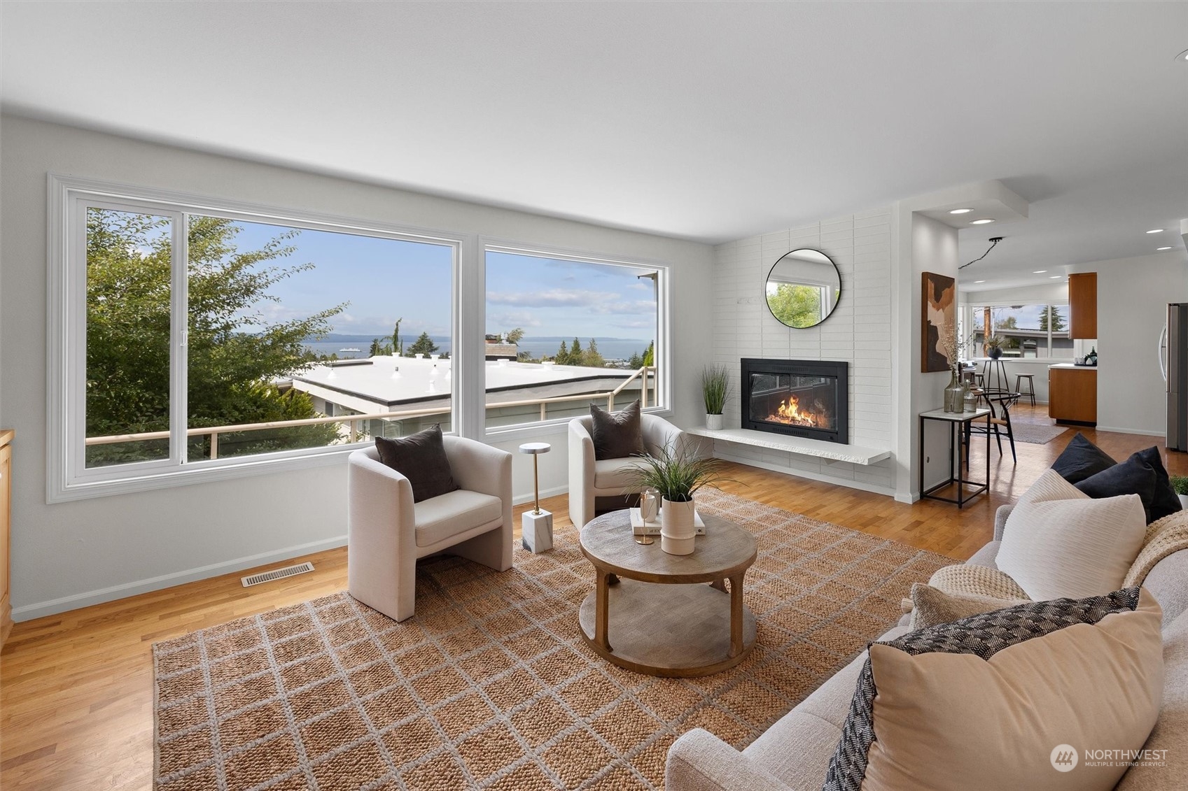 730 Laurel Street Edmonds, WA 98020 - Photo 4 of 36 a living room with furniture and a fireplace
