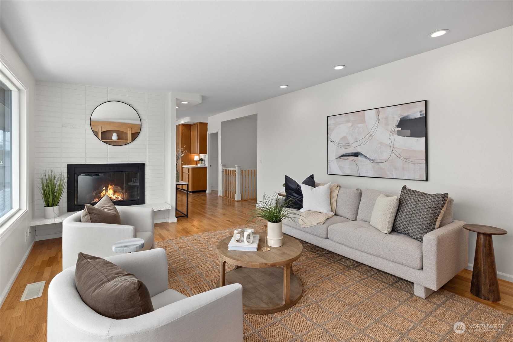 730 Laurel Street Edmonds, WA 98020 - Photo 5 of 36 a living room with furniture and a fireplace