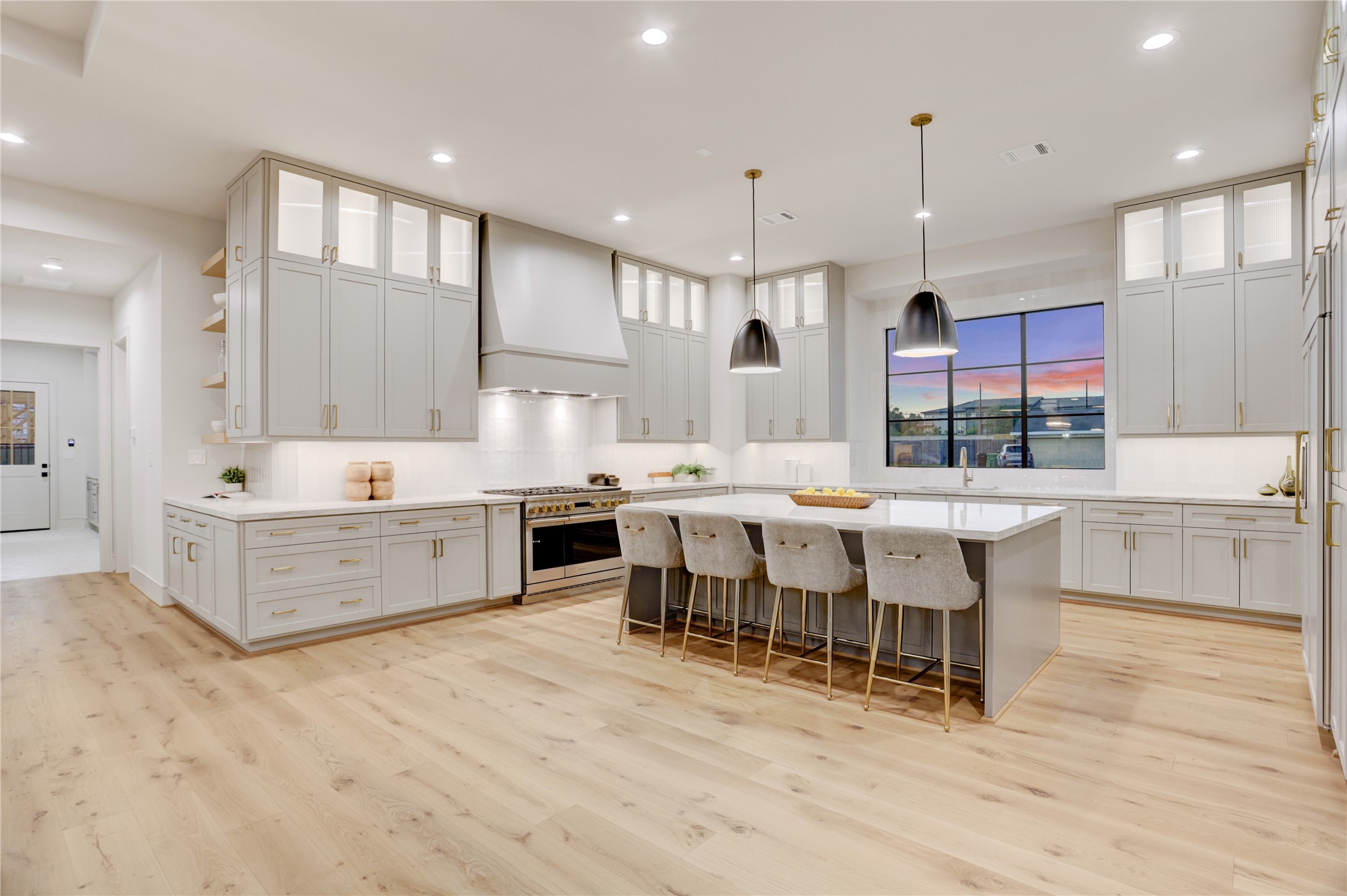 8935 Pado Street Houston, TX 77055 - Photo 13 of 50 a large kitchen with lots of counter space and a sink
