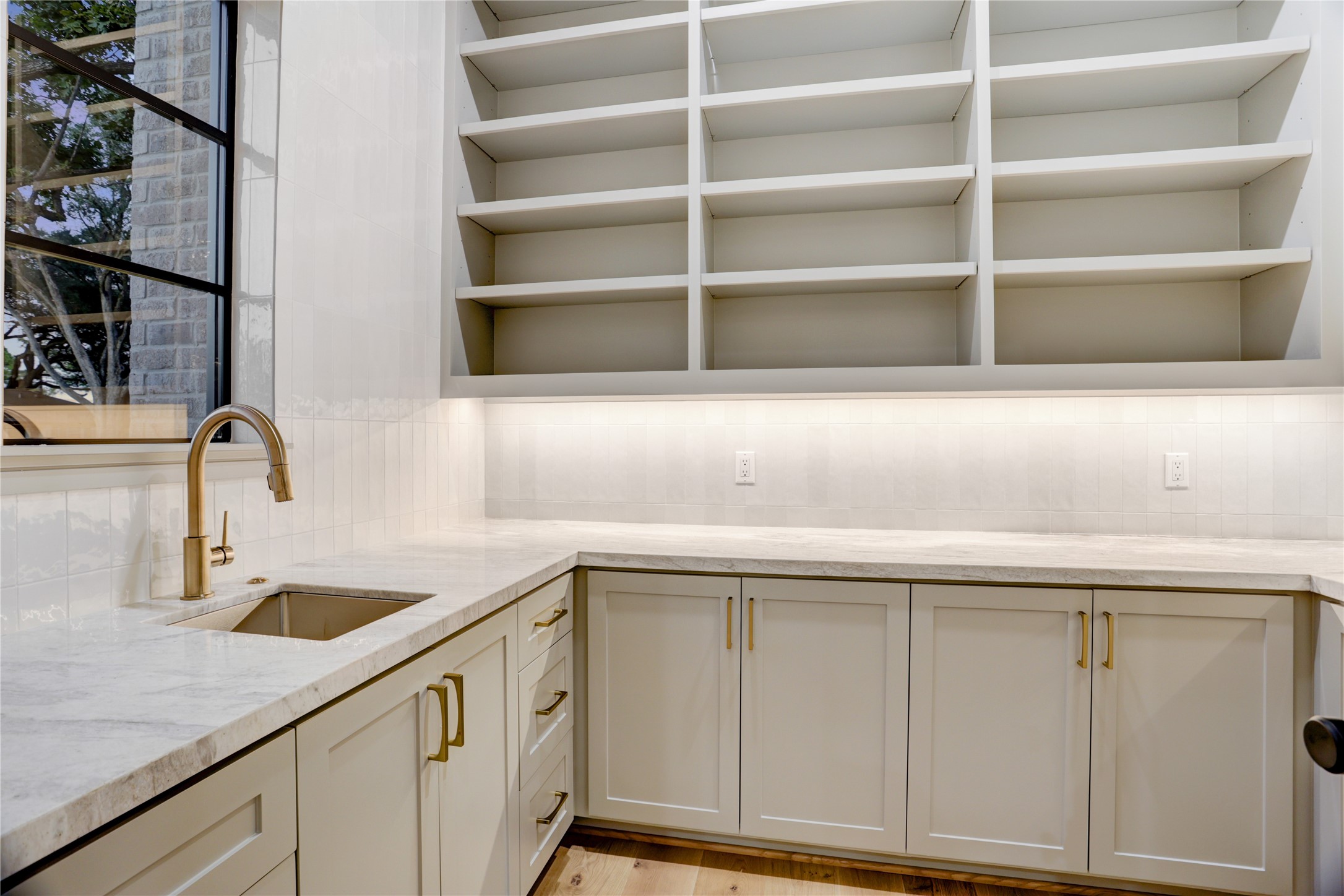 8935 Pado Street Houston, TX 77055 - Photo 20 of 50 a kitchen with a sink and a cabinet
