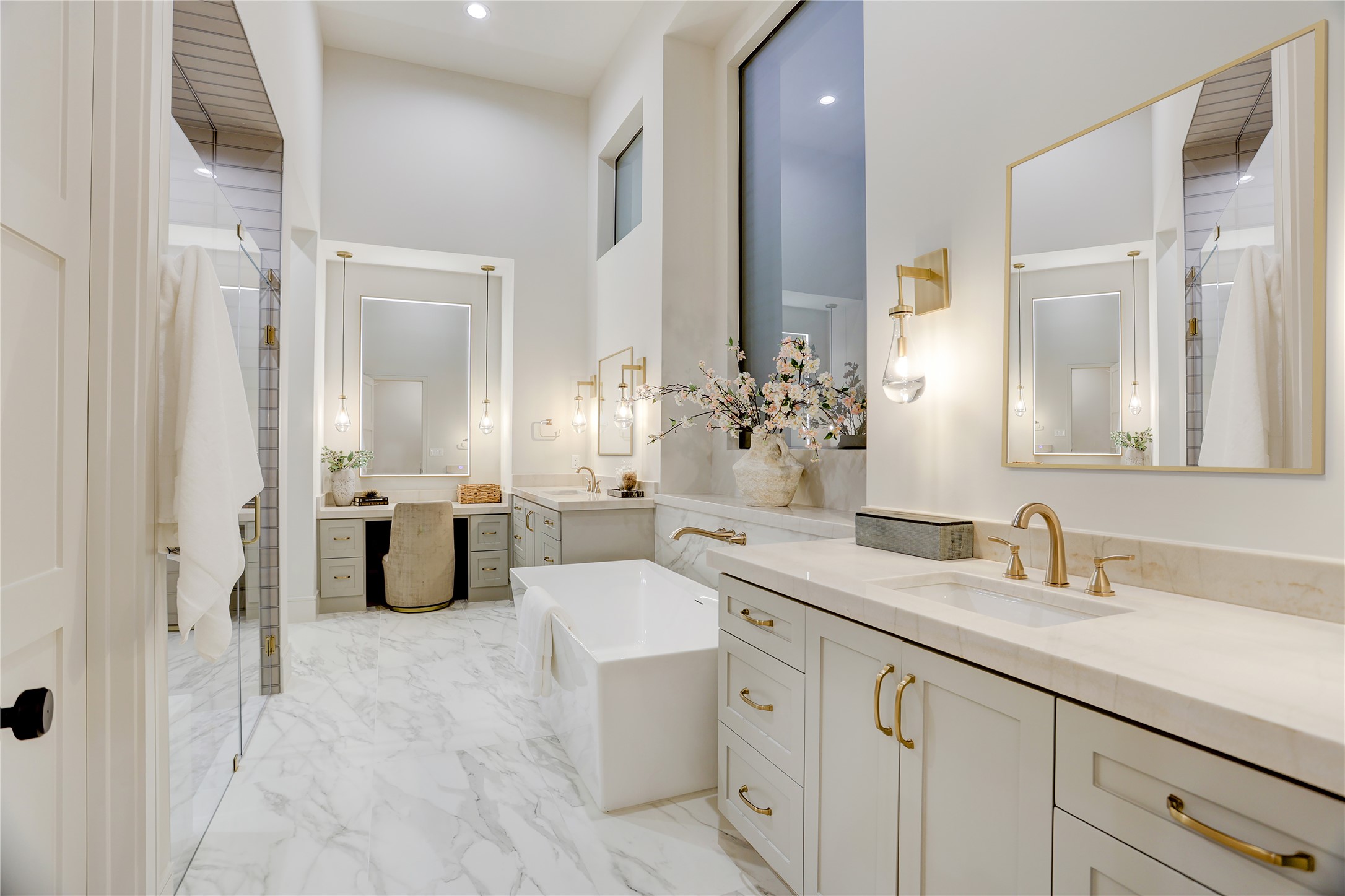 8935 Pado Street Houston, TX 77055 - Photo 25 of 50 a spacious bathroom with a double vanity sink mirror and double