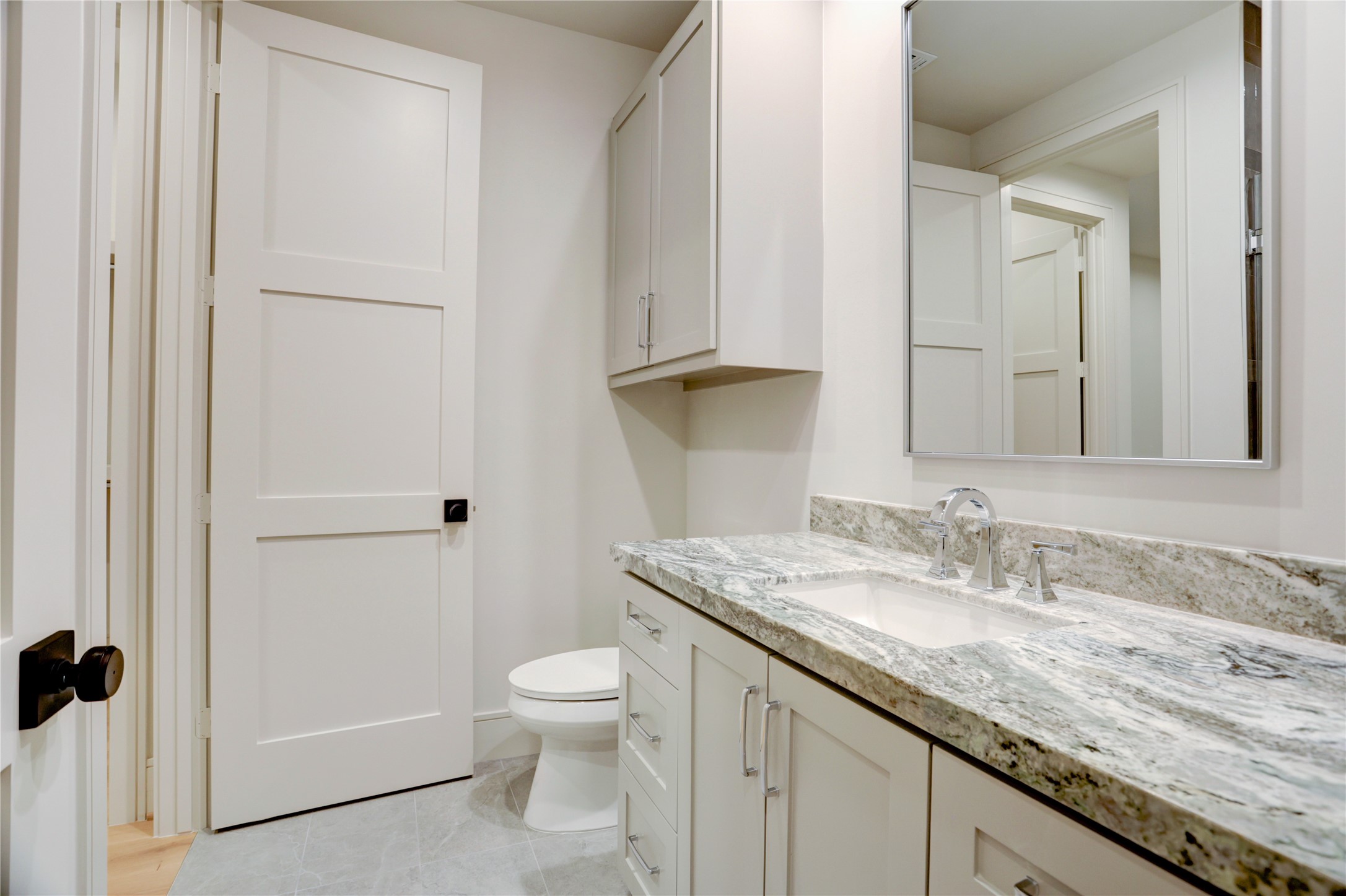 8935 Pado Street Houston, TX 77055 - Photo 41 of 50 a bathroom with a granite countertop sink toilet and shower
