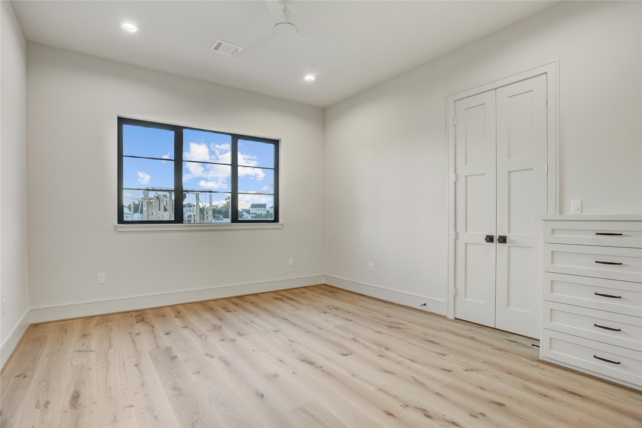 8935 Pado Street Houston, TX 77055 - Photo 46 of 50 wooden floor in an empty room with a window