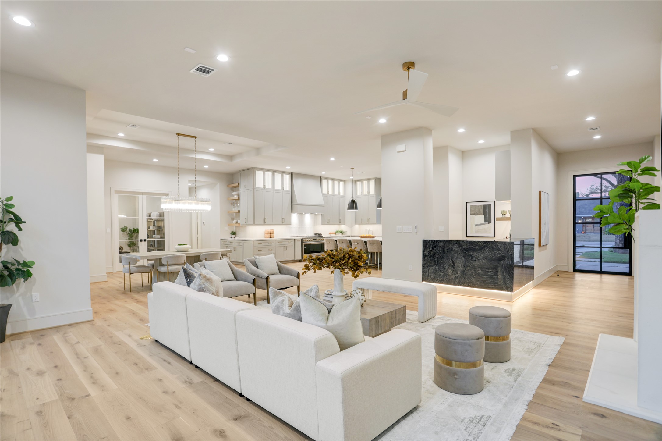 8935 Pado Street Houston, TX 77055 - Photo 10 of 50 a living room with furniture and a view of kitchen