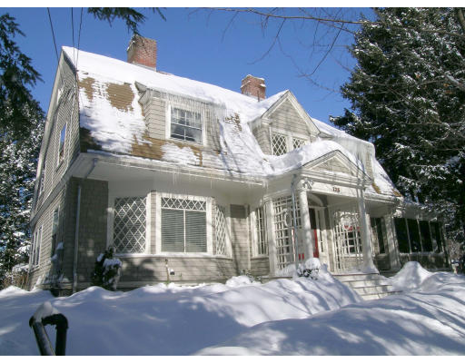 175 Pine Ridge Road Newton, MA 02468 - Photo 1 of 18 a view of a white building among the street with palm trees