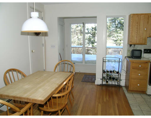 175 Pine Ridge Road Newton, MA 02468 - Photo 11 of 18 a dining room with furniture and wooden floor