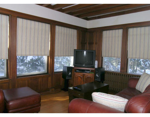 175 Pine Ridge Road Newton, MA 02468 - Photo 16 of 18 a living room with furniture and a flat screen tv