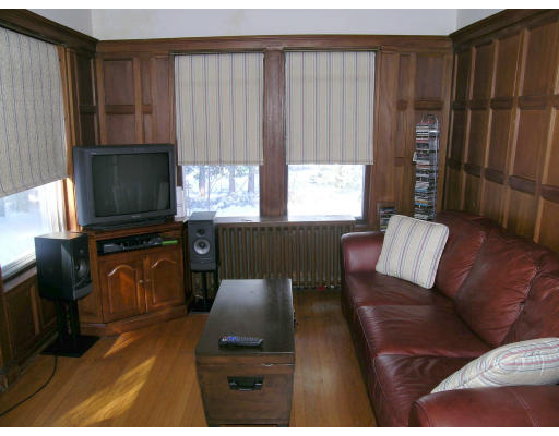 175 Pine Ridge Road Newton, MA 02468 - Photo 17 of 18 a living room with furniture and a flat screen tv