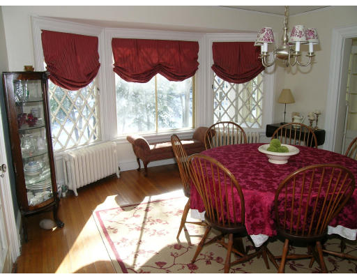 175 Pine Ridge Road Newton, MA 02468 - Photo 4 of 18 a bedroom with a bed mirror and window