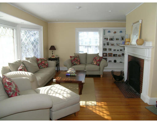 175 Pine Ridge Road Newton, MA 02468 - Photo 6 of 18 a living room with furniture a fireplace and window