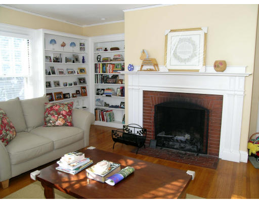 175 Pine Ridge Road Newton, MA 02468 - Photo 8 of 18 a living room with furniture a fireplace and a window