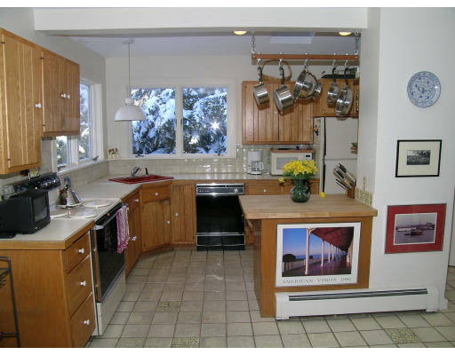 175 Pine Ridge Road Newton, MA 02468 - Photo 9 of 18 a kitchen with a sink and cabinets