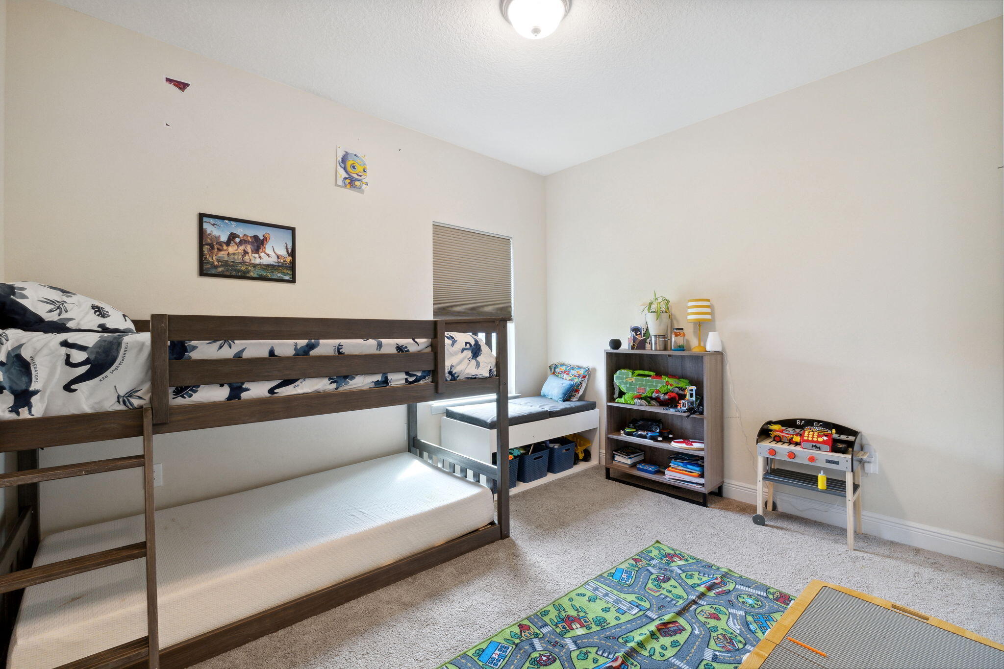 585 Riverwalk Circle Freeport, FL 32439 - Photo 13 of 36 a bedroom with furniture and a wooden floor