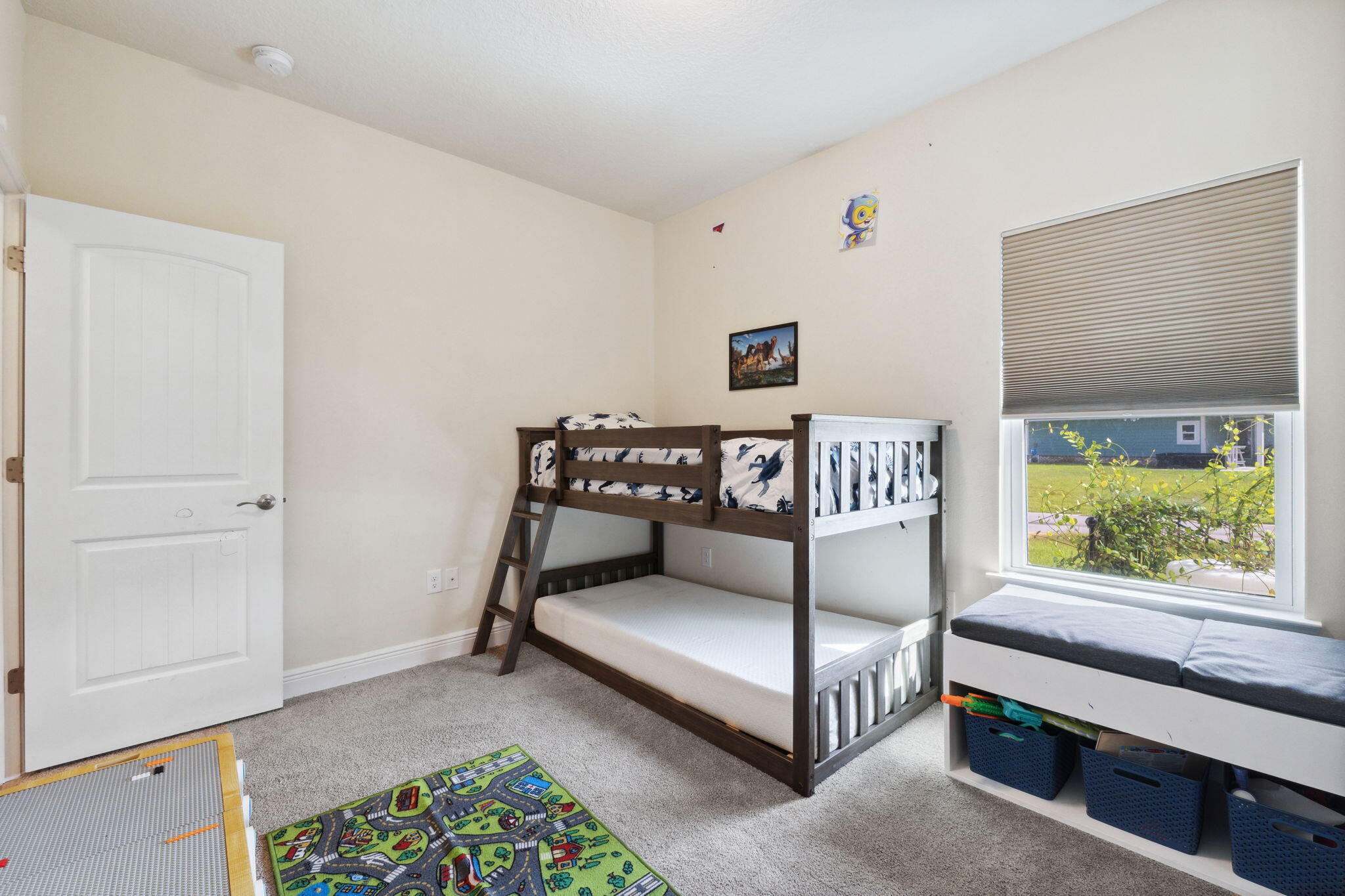 585 Riverwalk Circle Freeport, FL 32439 - Photo 14 of 36 a bedroom with a bed and a window